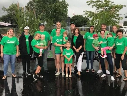 O'Connell Pharmacy staff marching together in a local parade